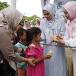 Kolaborasi TP. PKK, DWP, dan OPD Provinsi Lampung Bagikan Ratusan Takjil untuk Masyarakat